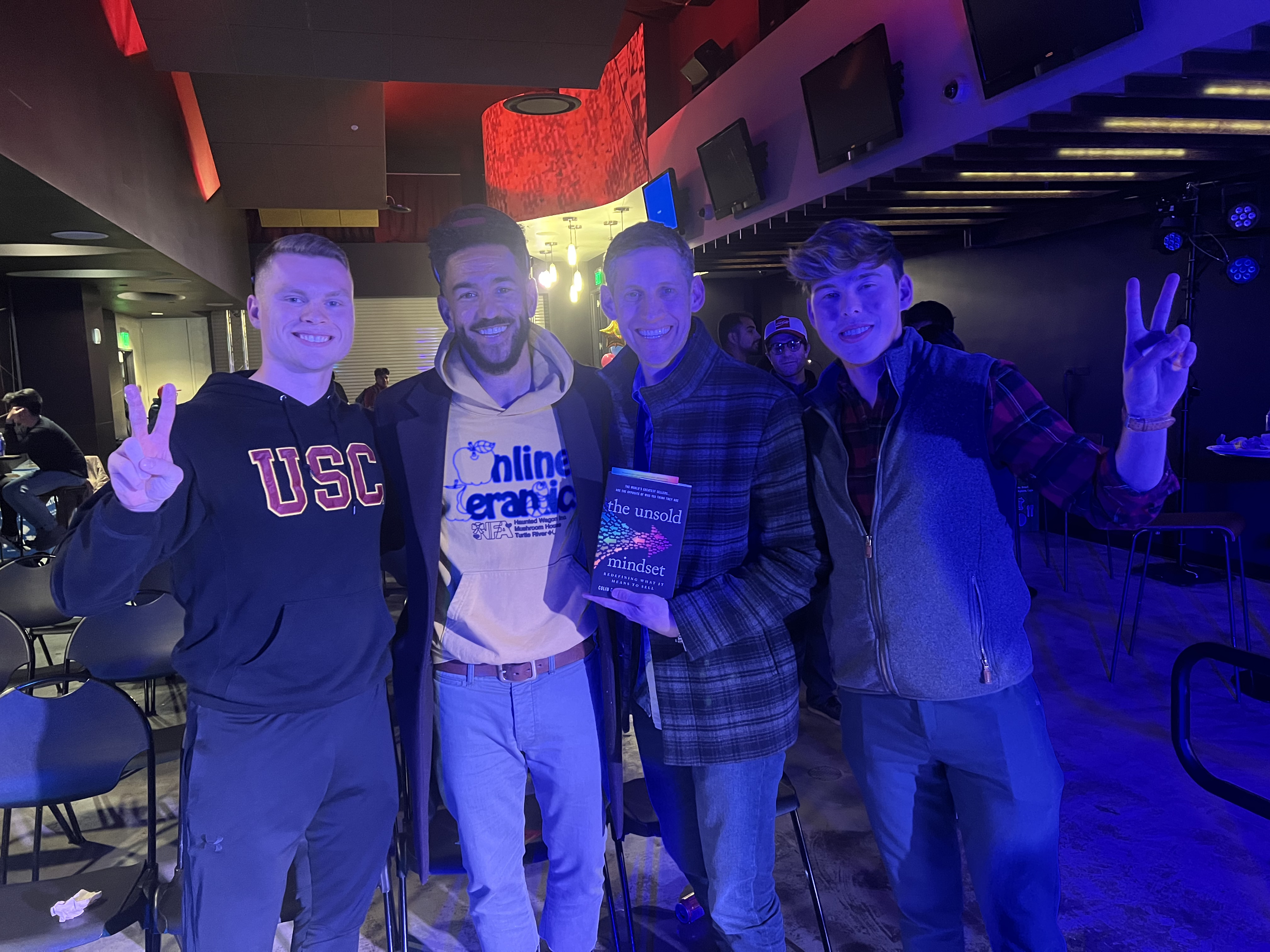 Jacob with Colin Coggins, Garrett Brown, and classmate George after the Sales Mindset class